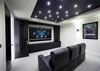 Dedicated home theater with starlight ceiling and recliners